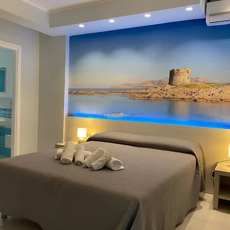 On The Promenade Of Stintino, With Air Conditioning And Private Bathroom * Stintino