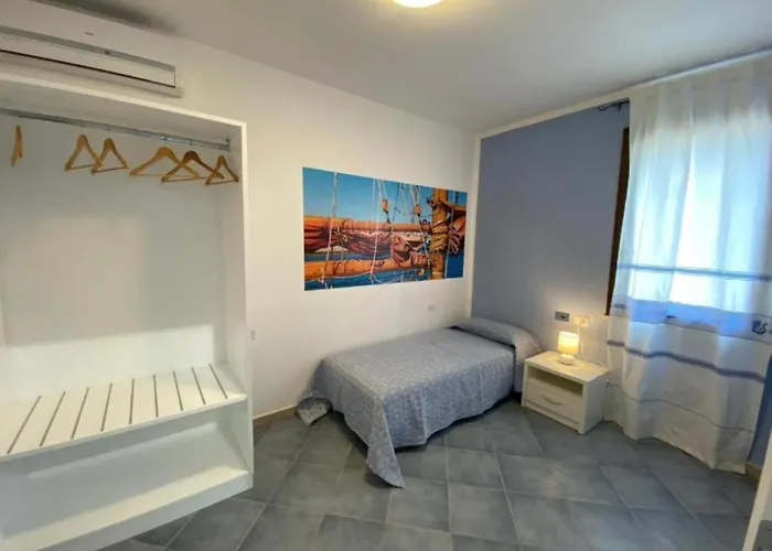 Hotel On The Promenade Of Stintino, With Air Conditioning And Private Bathroom *
